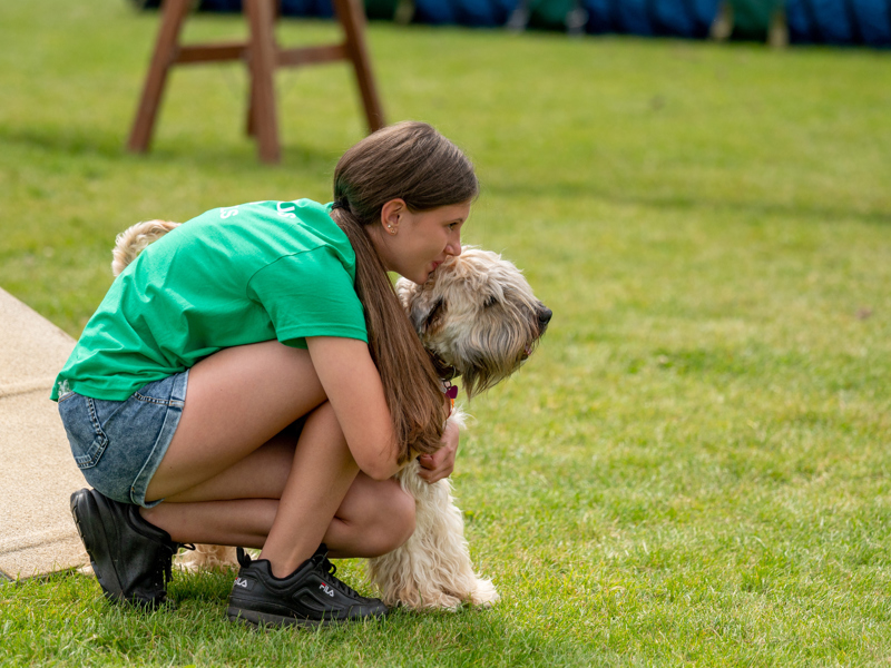 YKC member with their dog